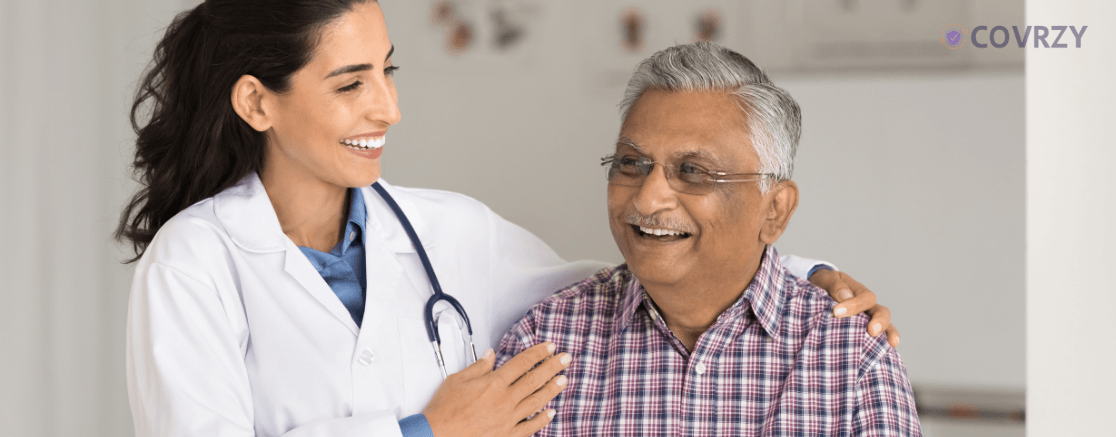a lady doctor smiling with a veteran Indian man 