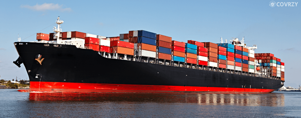 This is an image about a ship sailing with cargo mid-sea