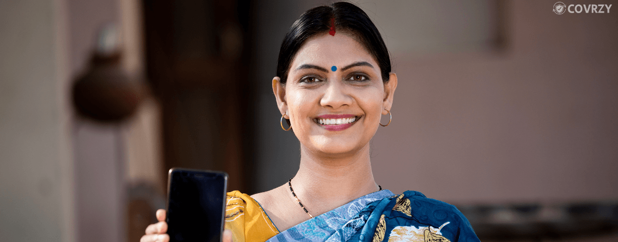 A woman entrepreneur is seen to be holding a phone