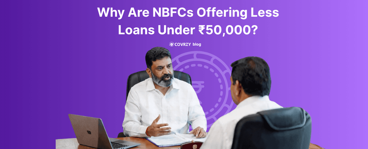 A middle aged Indian in a white formal shirt man talking to another man, both are sit in corporate chairs, while a laptop is open near them. The background is violet and the text "Why Are NBFCs Offering Less Loans Under ₹50,000" written on it